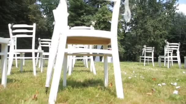 Outside registration at the wedding, white beautiful chairs — Stock Video