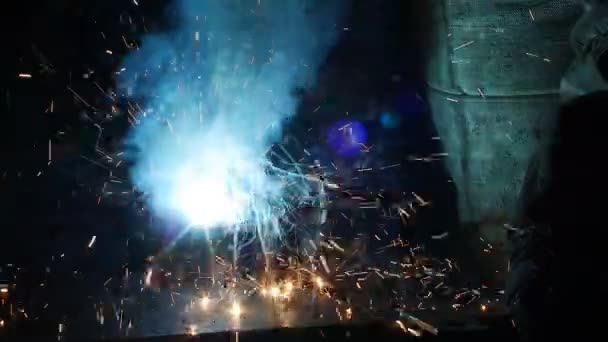 Welding of metal parts, a lot of sparks and smoke, close-up, industry, slo-mo, — Stock Video