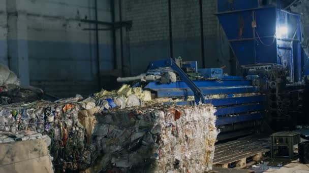 Compaction machine in plant for sorting garbage or rubbish — Stock Video