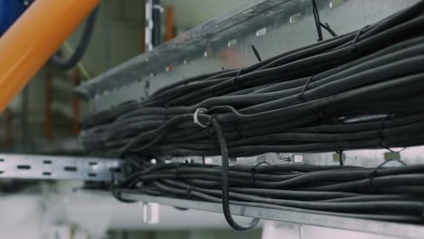 Installation of flexible power electrical cables lie in the channels — Stock Video