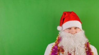 Mutlu adam giyen Santa Clauss kap beyaz sakallı, yeni yıl 2019 ve Noel'de yeşil Chroma key