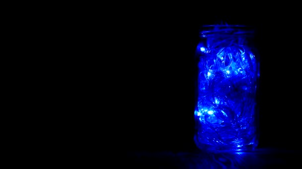 Γυάλινο βάζο με νέα χρόνια αφρώδη πολύχρωμα φώτα, το έτος 2019, Χριστούγεννα, αντίγραφο χώρου, διακόσμηση, Χριστούγεννα φώτα — Αρχείο Βίντεο