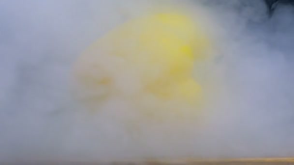 Sweet yellow bell pepper or capsicum blown by smoke or steam from the side in slowmo, cloese up — Stock Video