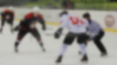Hokey oyun çocuklar ve yetişkinler, arka plan, bulanık, ağır çekim, stadyum