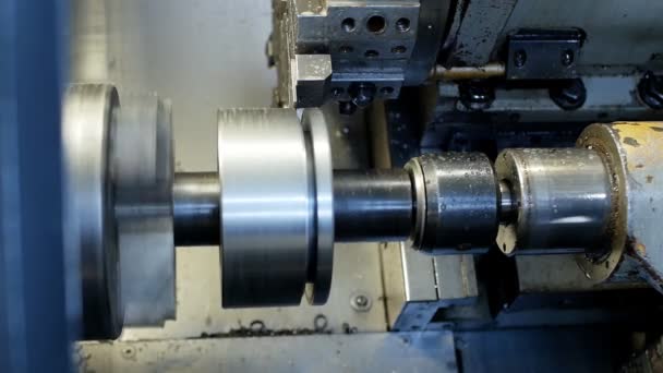 Modern metal lathe grinds metal part, automatic machine-tool, industrial, metalworking — Stock Video