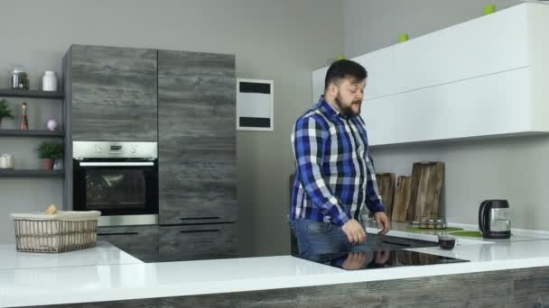 Sleepy Thick Bearded Male Goes Cup Coffee Drinks Modern Kitchen — Stock Video