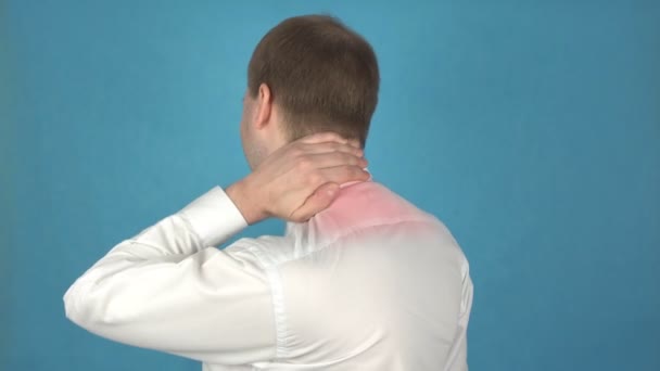 Pain in the neck muscles and shoulders due to long-term work at the computer. Myositis. Concept of kyphosis or Osteochondrosis. Man in white shirt suffers from Rachiocampsis. Office worker or manager — Stock Video