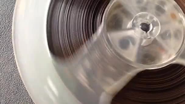 Spool of tape recorder closeup — Stock Video