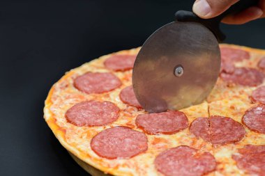 Pizza pepperonisi tatlandırıcı.