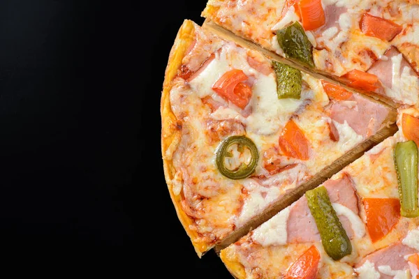 Pizza isolated on black — Stock Photo, Image