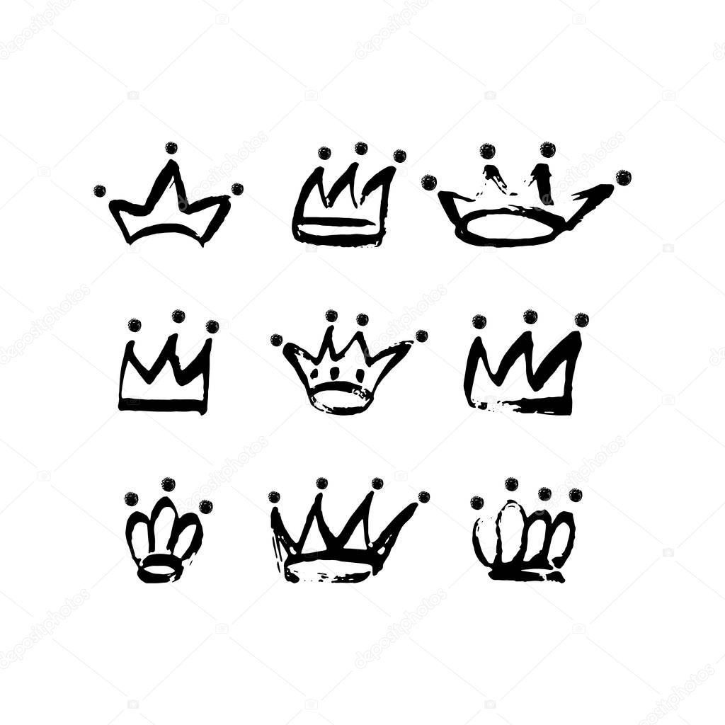 Hand drawn crown icon set in black color. Ink brush crowns background.