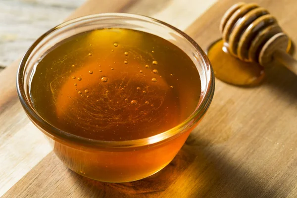 Raw Dark Organic BuckWheat Honey in a Bowl