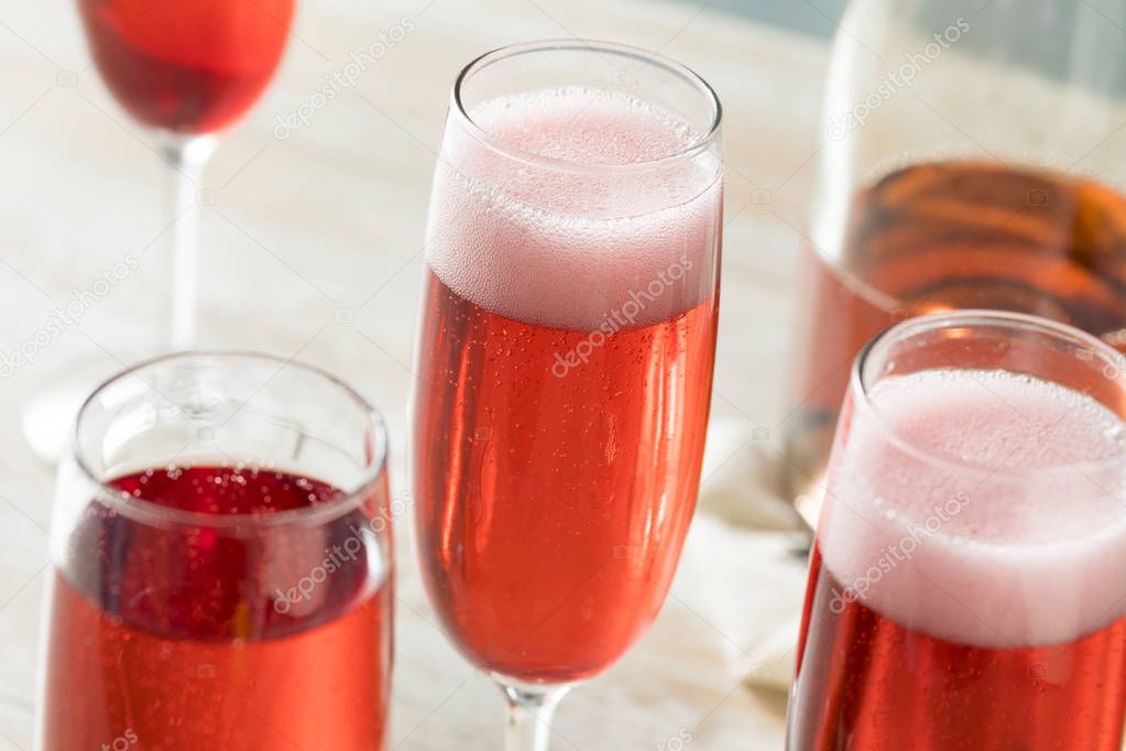 Sweet homemade Rose Mimosas with Berry Syrup