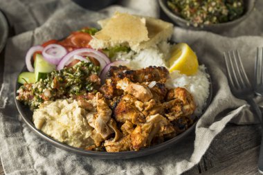 Ev yapımı hünkar tabağı humus pirinç ve Pide ile