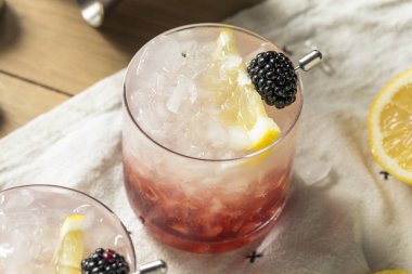 Alcoholic Blackberry Gin Bramble Cocktail with Lemon clipart