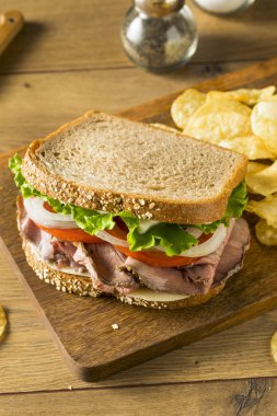 Homemade Roast Beef Deli Sandwich with Lettuce and Tomato clipart