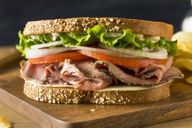 Homemade Roast Beef Deli Sandwich with Lettuce and Tomato clipart