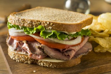 Homemade Roast Beef Deli Sandwich with Lettuce and Tomato clipart