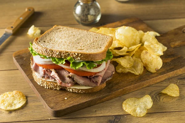 Homemade Roast Beef Deli Sandwich with Lettuce and Tomato