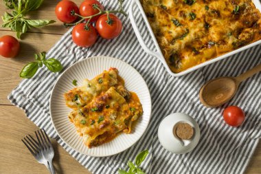 Baked Stuffed Vegetarian Cannelloni with Broccoli Basil and Cheese clipart