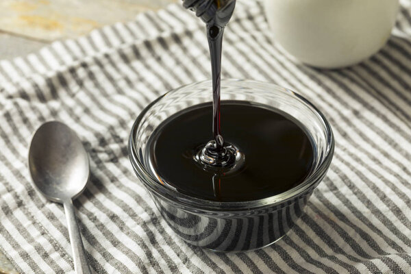 Organic Black Cane Sugar Molasses in a Bowl