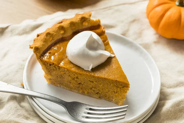 Sweet Homemade Thanksgiving Pumpkin Pie Ready to Eat