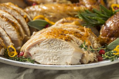 Roasted Cut Up Turkey Platter For Thanksgiving with All the Sides clipart