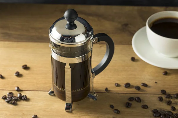 Warm Homemade French Press Coffee in a Cup