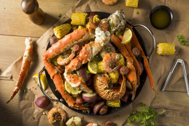 Homemade Cajun Seafood Boil with Lobster Crab and Shrimp clipart