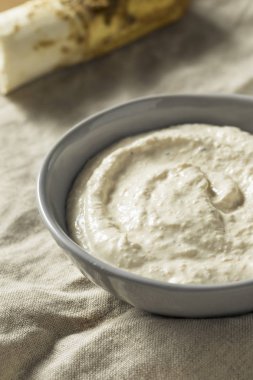 Spicy Homemade Horseradish Sauce in a Bowl clipart