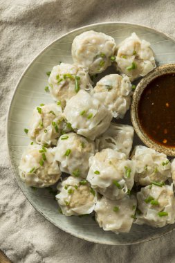 Homemade Pork Shu Mai Dumplings with Dipping Sauce clipart