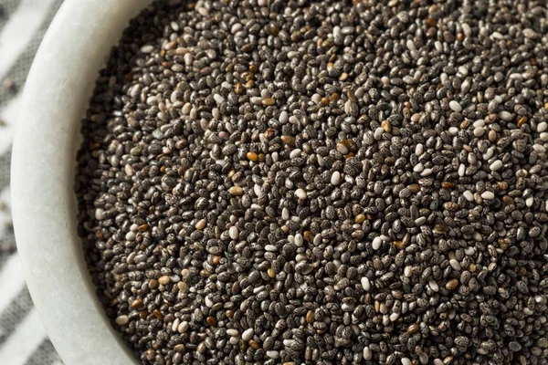 Черные семена чиа — стоковое фото
