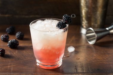 Boozy Blackberry Bramble Gin Cocktail with Lemon clipart