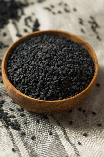 Raw Dry Organic Black Sesame Seeds in a Bowl