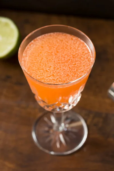 Boozy Red Naked Famous Cocktail Lime Chartreuse — Stock Photo, Image