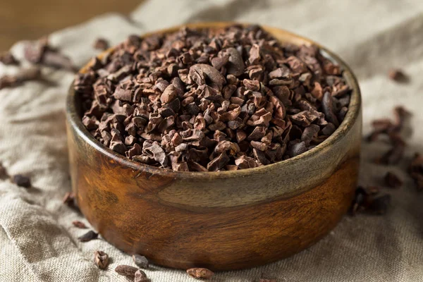 Raw Brown Organic Chocolate Cocao Nibs in a Bowl