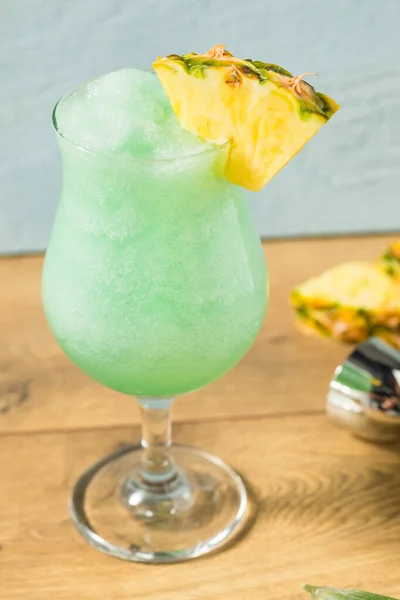 Boozy Frozen Blue Hawaii Cocktail Pineapple Curacao — стокове фото