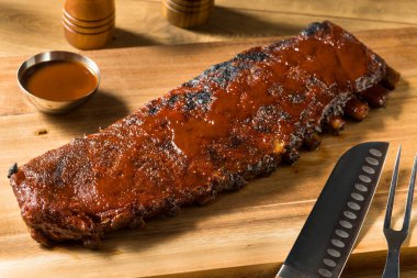 Homemade Smoked St Louis Style Spare Ribs with BBQ Sauce clipart