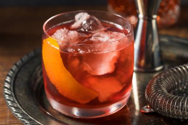 Refreshing Boozy Boulevardier Cocktail with Orange and Vermouth clipart
