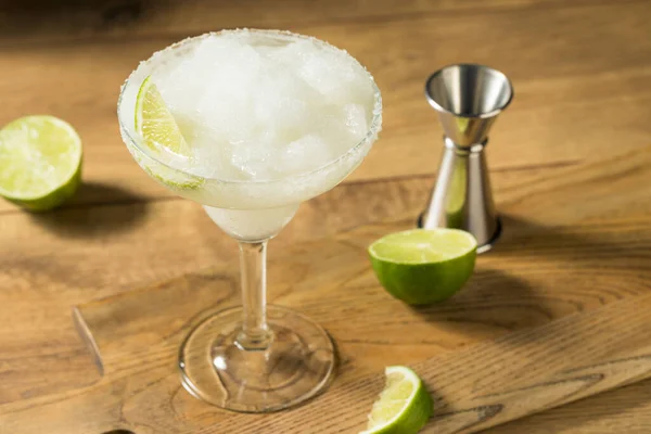 Refreshing Cold Boozy Frozen Tequila Margarita with Salt and Lime