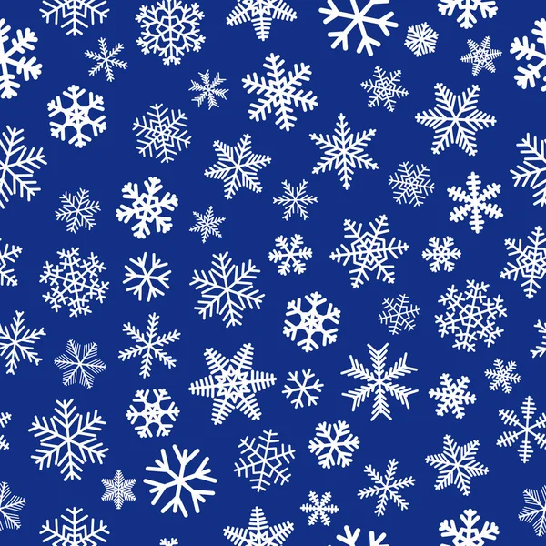 Kar taneleri, mavi zemin üzerine beyaz Noel seamless modeli