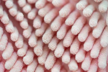 Kapalı-up pembe mikrofiber bez doku arka plan ayrılmaktadır. Makro çekim.