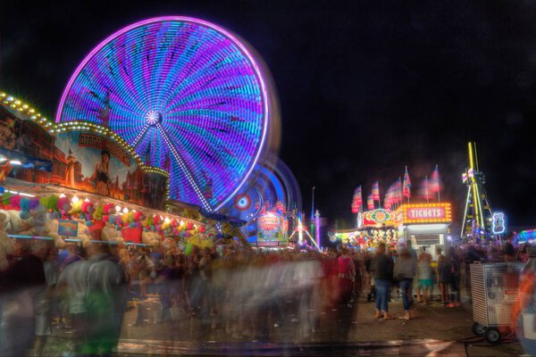 The Minnesota State fair is the largest gathering in Minnesota and millions of people attend during the two weed period.