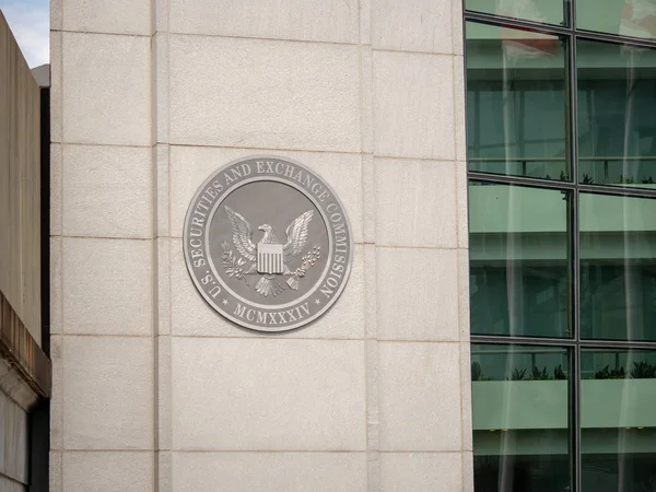 Estados Unidos Comisión de Bolsa y Valores Logotipo de SEC en la entrada del edificio DC cerca de la calle H Imagen De Stock