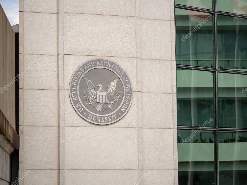Washington, DC SEPTEMBER 22, 2018: United States Securities and Exchange commission SEC logo on entrance of DC building near H street