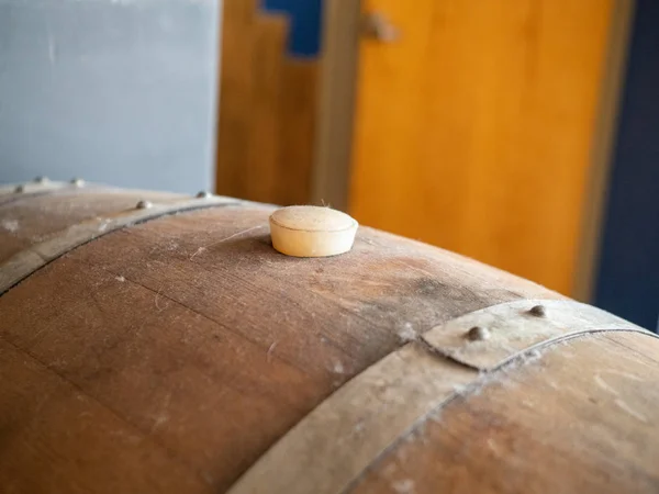 Top of barrel aged wine barrel stopper cork plug in winery