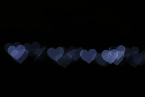 San Valentino Colorato Forma Cuore Bianco Sfondo Nero Illuminazione Bokeh — Foto Stock