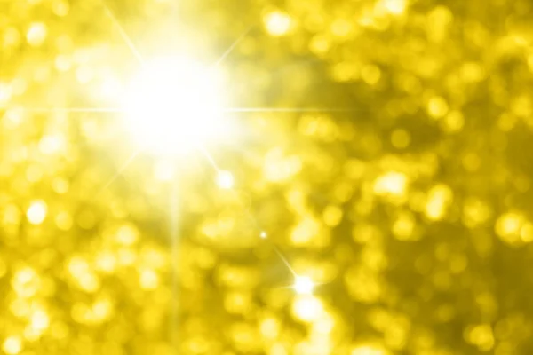 美丽闪闪发光的黄金背景与照明黄金黄色波克效果的图片 黄金闪闪发光的背景 — 图库照片