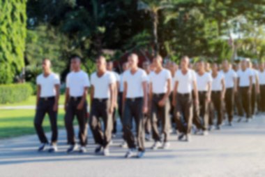 Birçok kişi hazırlık öğrencileri genç adam stajyer asker resim arka plan bulanık veya yürüyüş egzersiz için üst üste sağlıklı iyi polis ve gruplar Caddesi üzerinde yapıldı.