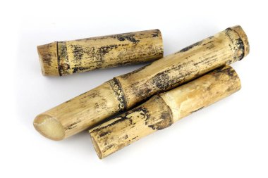 Beyaz arka plan şeker kamışı şeker kamışı şeker kamışı, şeker kamışı yığın, yanık, baston, parçası izole